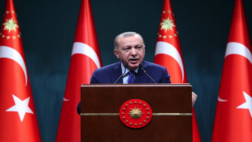 Turkish President Recep Tayyip Erdogan delivers a speech following an evaluation meeting at the Presidential Complex in Ankara on April 5, 2021. Erdogan accused dozens of retired admirals of eyeing a "political coup" by attacking his plans for a canal linking the Black Sea to the Mediterranean. His fury was directed at a letter published by 104 former admirals over the weekend urging him to abide by the terms of the 1936 Montreux Convention. 