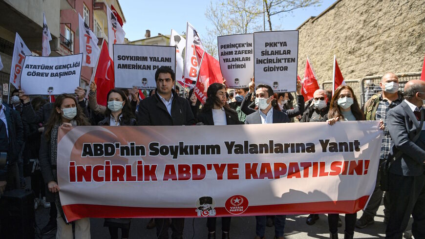 Protesters take part in a demonstration outside the US consulate in Istanbul on April 26, 2021, as a banner reads as 'An answer of USA's lies, close the US base in Incirlik', following the decision of US President Joe Biden to recognize the Armenian genocide in 1915-1917. 