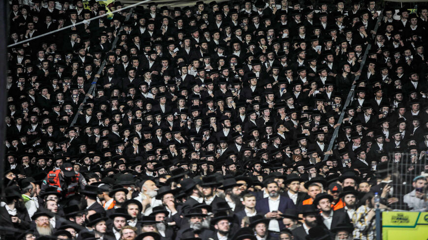 Ultra-Orthodox Jews gather at the grave site of Rabbi Shimon Bar Yochai at Mount Meron as they celebrate the Jewish holiday of Lag Ba'Omer, marking the anniversary of the death of the Talmudic sage, approximately 1,900 years ago, Israel, April 29, 2021.