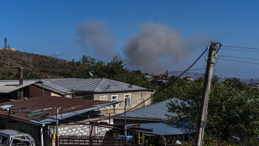 Smoke from a presumed drone or artillery strike on October 3, 2020, in Stepanakert, Nagorno-Karabakh.
