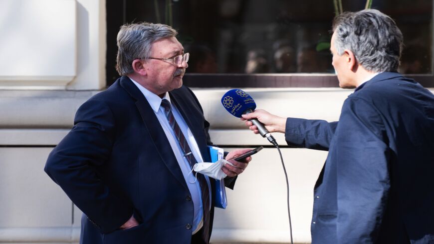 Russia’s governor to the International Atomic Energy Agency (IAEA), Mikhail Ulyanov, is interviewed as he leaves after the Iran nuclear talks on April 6, 2021, in Vienna, Austria. Representatives from the United States, Iran, the European Union and other participants from the original Joint Comprehensive Plan of Action (JCPOA) are meeting both directly and indirectly over possibly reviving the plan. 