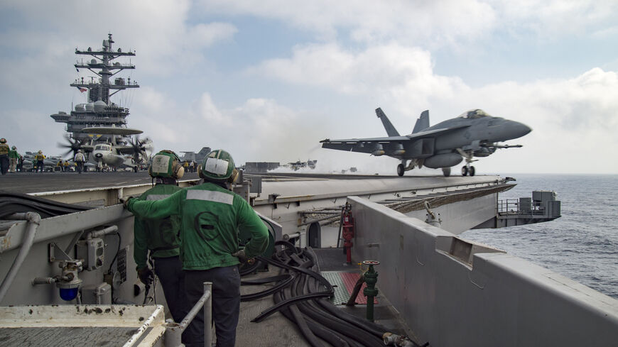 In this handout provided by the U.S. Navy, an F/A-18E Super Hornet assigned to the Sidewinders of Strike Fighter Squadron (VFA) 86 launches from the flight deck of the aircraft carrier USS Dwight D. Eisenhower (CVN 69)on June 28, 2016 in the Mediterranean Sea.