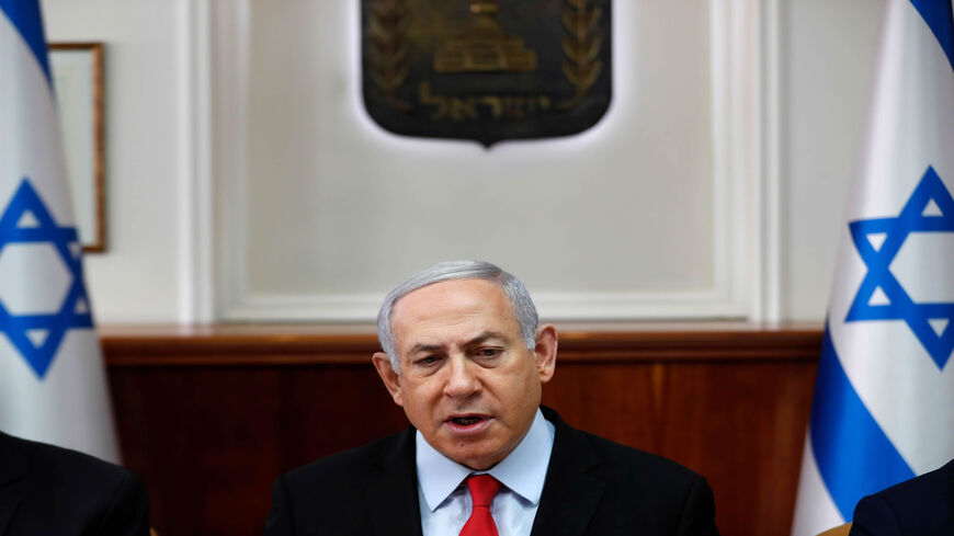 Israeli Prime Minister Benjamin Netanyahu chairs a Cabinet meeting, as an escalation of violence raged for a second day in the Gaza Strip, Jerusalem, Nov. 13, 2019.
