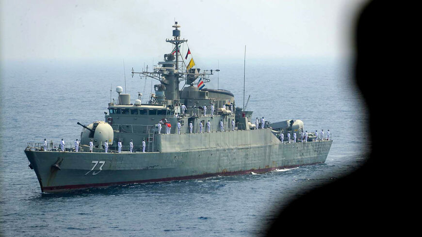 A handout photo provided by the Iranian army official website shows an Iranian naval ship parading during the last day of a military exercise in the Gulf, near the strategic Strait of Hormuz, southern Iran, Sept. 12, 2020.