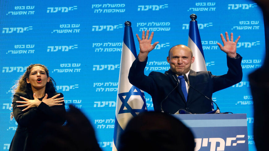 Leader of the Israeli right-wing Yamina party Naftali Bennett addresses supporters at his party's campaign headquarters, after the end of voting in the fourth national election in two years, Tel Aviv, Israel, March 24, 2021.