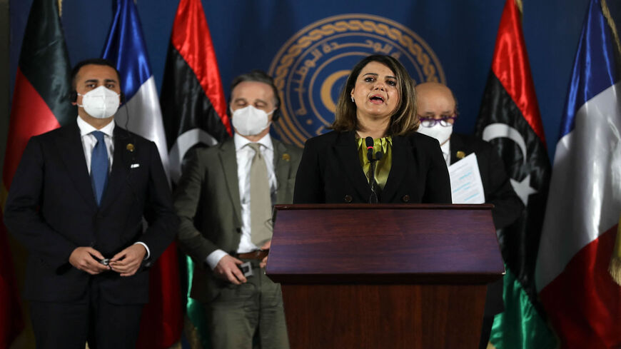 Libyan Foreign Minister Najla al-Mangoush speaks, as her counterparts (R to L) French Jean-Yves Le Drian, German Heiko Maas and Italian Luigi Di Maio listen, during a press conference, Tripoli, Libya, March 25, 2021.