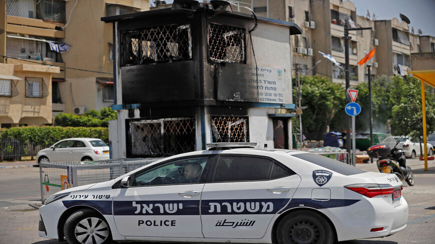 A torched observation post is seen outside a religious Jewish school in the central city of Lod, near Tel Aviv, following nighttime clashes between Arab Israelis and Israeli Jews, Israel, May 11, 2021.