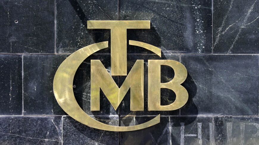 A picture taken on Aug. 14, 2018, shows the logo of Turkey's Central Bank (TCMB) at the entrance of the bank's headquarters in Ankara, Turkey. 
