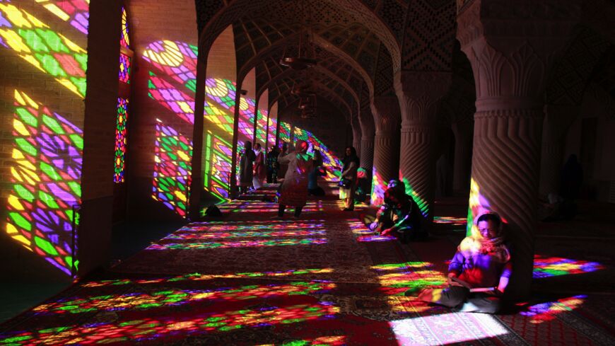Tourists visit the Nasir al-Mulk Mosque, also known as the Pink Mosque, in the southern Iranian city of Shiraz on Sept. 27, 2018.