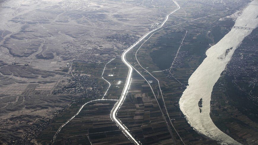 This picture shows an aerial view of the Nile River passing by the countryside north (bottom) of the southern city of Qena, Egypt, April 10, 2021.