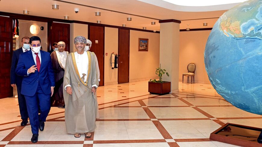 Omani Foreign Minister Sayyid Badr bin Hamad bin Hamood Al-Busaidi receives his Yemeni counterpart Ahmad Awad Bin Mubarak in Muscat