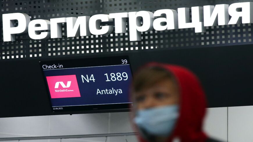 A Nordwind Airlines check-in desk stands at Novosibirsk Tolmachevo Airport, on June 22, 2021. Russia resumed flights with Turkey, suspended in April 2021 due to the COVID-19 pandemic.