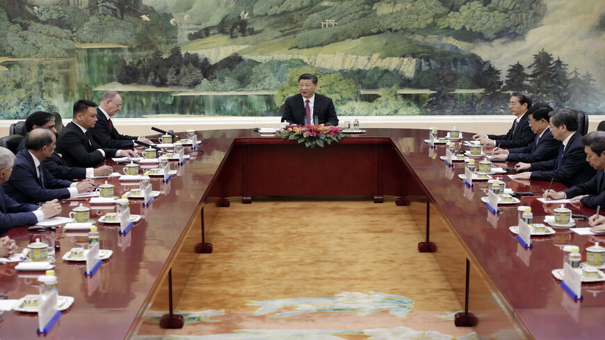 China's President Xi Jinping (C) speaks during a meeting with delegates of the Shanghai Cooperation Organization security secretary summit at the Great Hall of the People, Beijing, China, May 22, 2018.