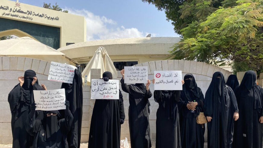 Omani women protest in front of the General Directorate for Housing and Planning in Salalah, Oman, May 28, 2021.