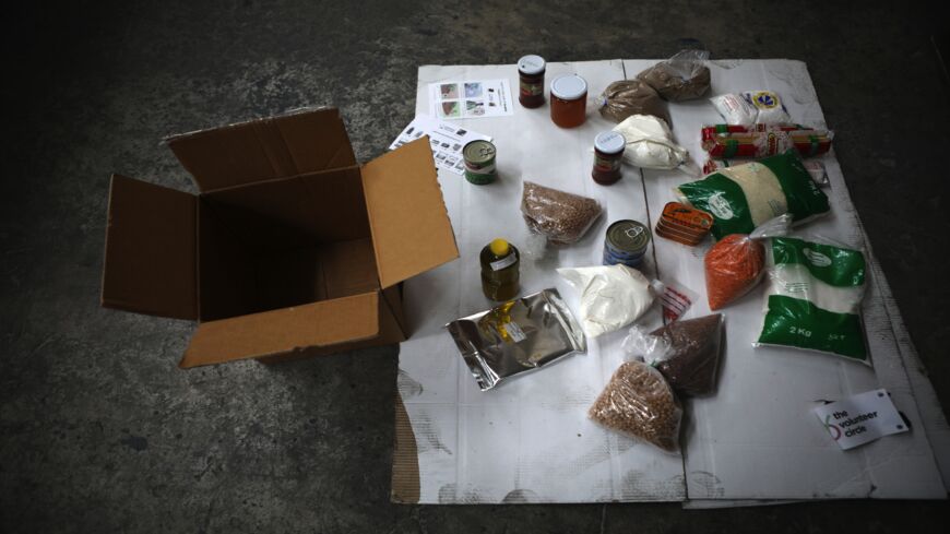 A picture taken in the Lebanese capital, Beirut, on May 29, 2020, shows the food products that constitute a ration, part of a relief campaign to help families in need across Lebanon.