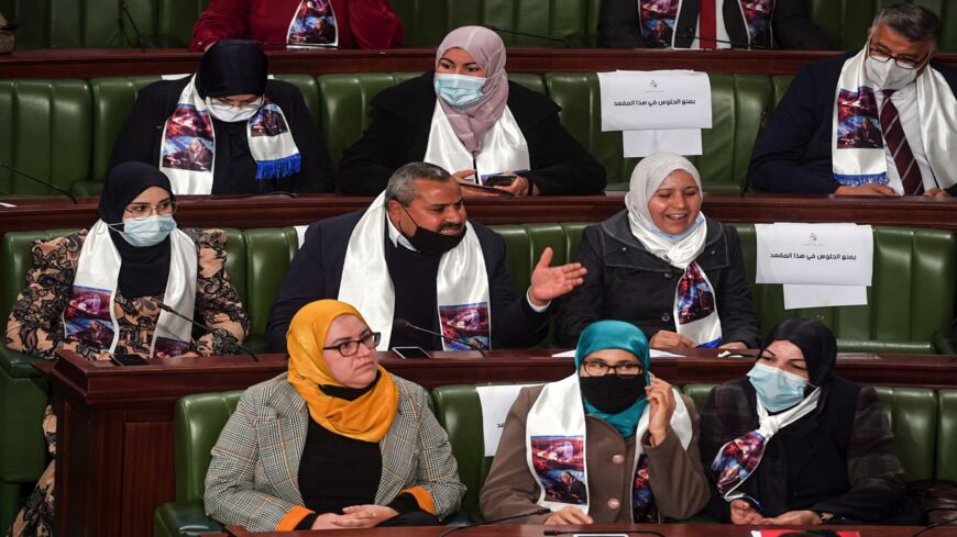 Members of the Ennahda Islamist bloc attend a parliamentary session.