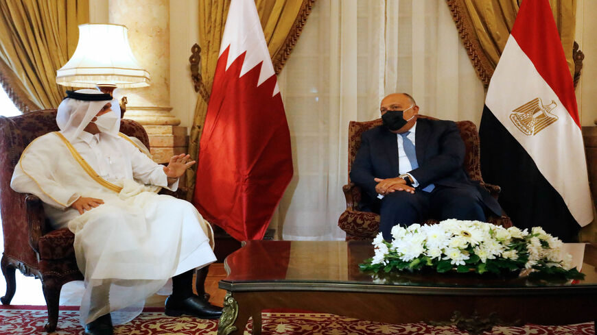 Egyptian Foreign Minister Sameh Shoukry (R) meets with Qatar's Deputy Prime Minister and Minister of Foreign Affairs Mohammed bin Abdulrahman bin Jassim Al Thani, Cairo, Egypt, May 25, 2021.