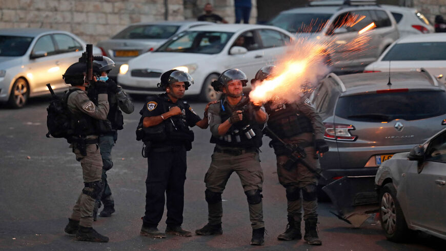 Israeli security forces fire tear gas to disperse Palestinian protesters amid clashes in the Israeli-annexed predominantly Arab neighborhood of Silwan, Jerusalem, June 29, 2021.