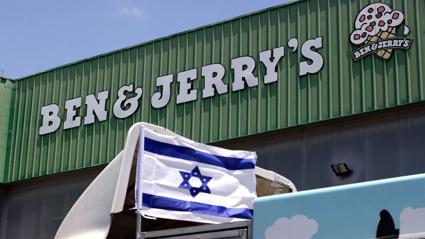 An Israeli flag is seen atop a delivery truck outside US ice cream maker Ben & Jerry's factory in Be'er Tuvia, Israel, July 21, 2021.