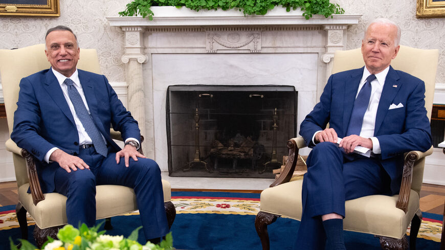 US President Joe Biden meets with Iraqi Prime Minister Mustafa Al-Kadhimi (L) in the Oval Office of the White House in Washington, DC, July 26, 2021.