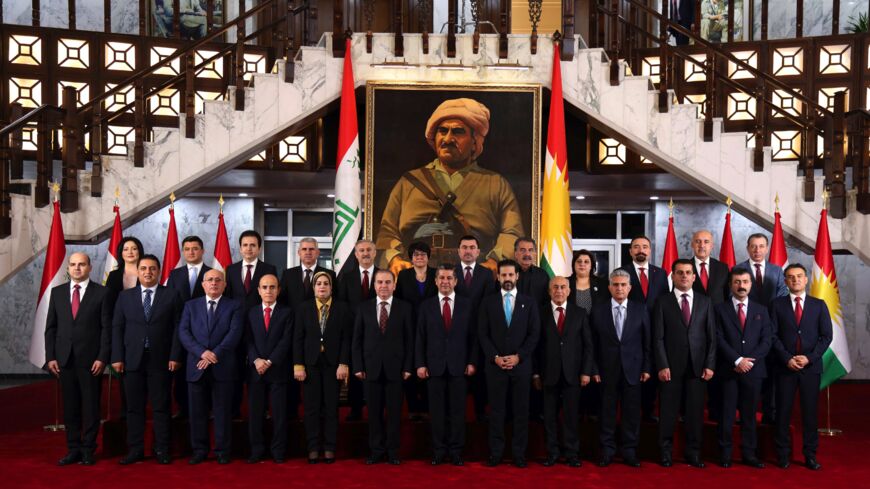 Members of the Cabinet of the Kurdistan Regional Government (KRG) headed by Prime Minister Masrour Barzani pose for a photograph in Erbil.