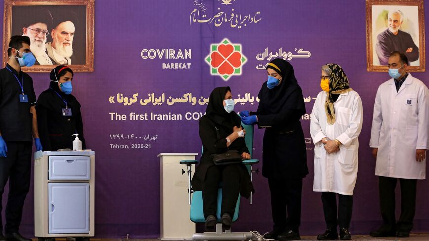 Iran professor gets vaccinated