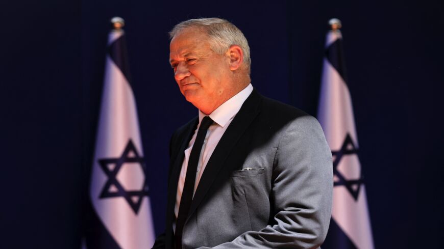 Israeli Minister of Defense Benny Gantz arrives for a photo at the president's residence during a ceremony for the new coalition government in Jerusalem, on June 14, 2021. 