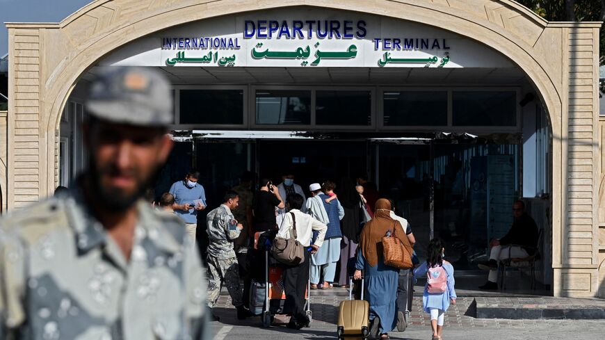 passengers departing Kabul airport 
