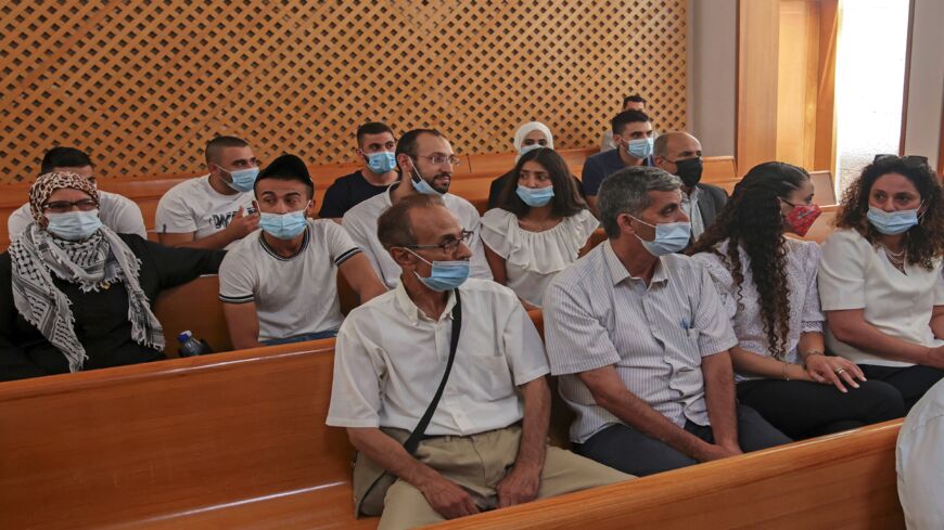 Palestinian residents of the Sheikh Jarrah neighborhood attend a hearing at Israel's Supreme Court in Jerusalem on Aug. 2, 2021.