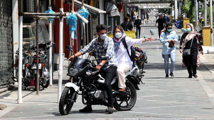 Motorcyclists with face masks in Tehran 