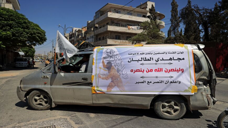 A van belonging to members of Syria's top jihadi group, Hayat Tahrir al-Sham.