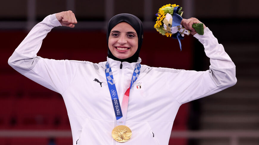 Gold medalist Feryal Abdelaziz of Team Egypt poses with the gold medal for the Women’s Karate Kumite +61kg on day 15 of the Tokyo 2020 Olympic Games at Nippon Budokan, Tokyo, Japan, Aug. 7, 2021.