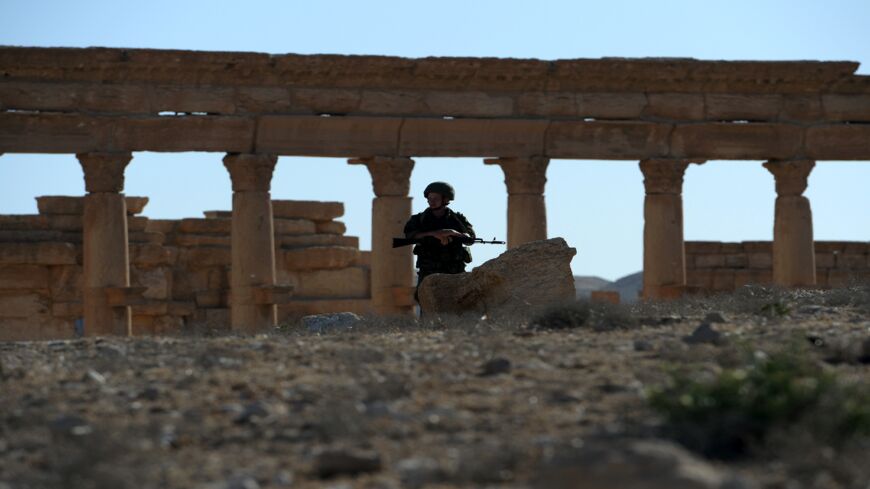 A Russian army soldier patrols the ancient Syrian city of Palmyra on May 5, 2016.