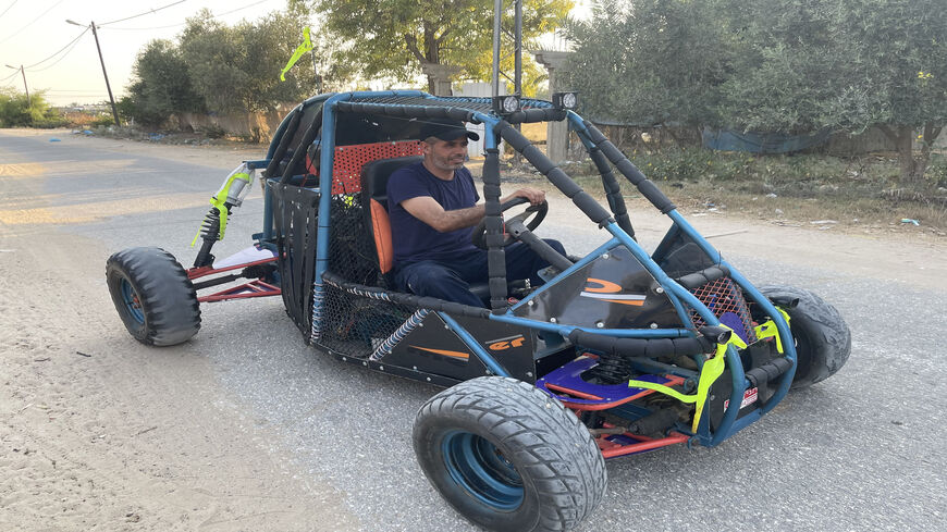 Fathi Salman Abu Gharaba is seen driving the "Desert Race" vehicle he built himself, al-Masdar, Gaza Strip.