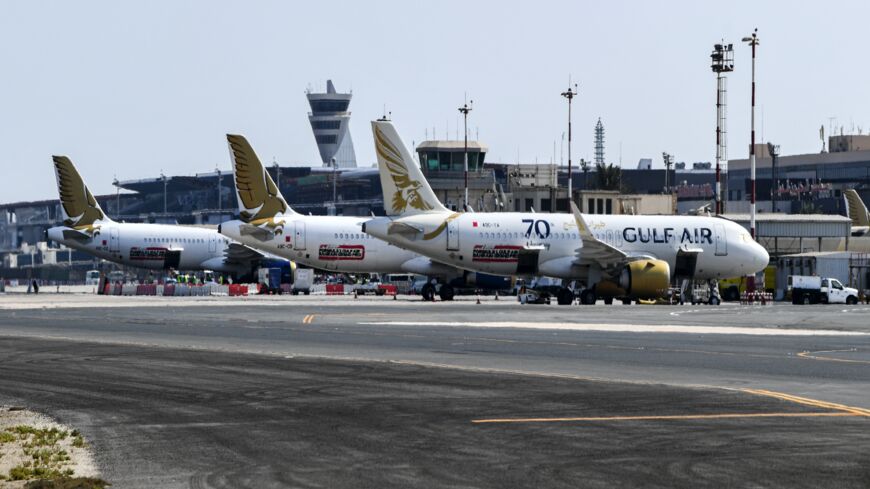 This picture taken on November 5, 2019, shows a view of Gulf Air Airbus A320 (R) and A321 (C, L) aircraft at Bahrain International Airport.