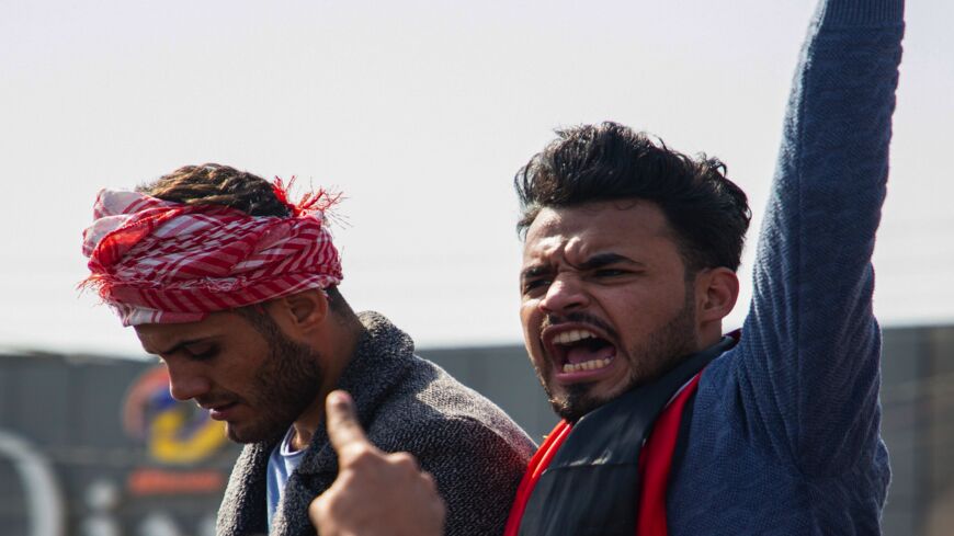 Iraqi demonstrators chant slogans during an anti-government demonstration by Basra University students in the southern city of Basra, on Feb. 11, 2020. 