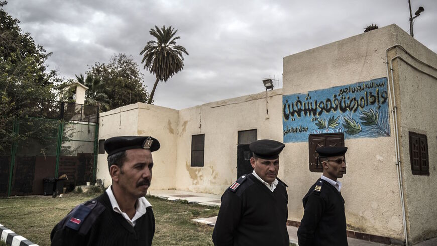 A picture taken during a guided tour organised by Egypt's State Information Service on Feb. 11, 2020, shows policemen standing guard in front of the Tora prison clinic on the southern outskirts of the Egyptian capital Cairo. 