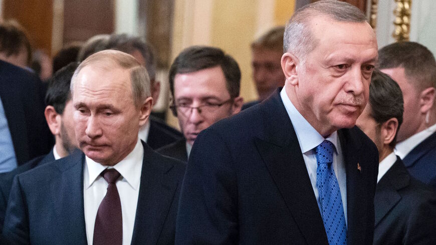 Russian President Vladimir Putin and his Turkish counterpart Recep Tayyip Erdogan arrive to hold a joint press statement following their talks at the Kremlin in Moscow on March 5, 2020. 