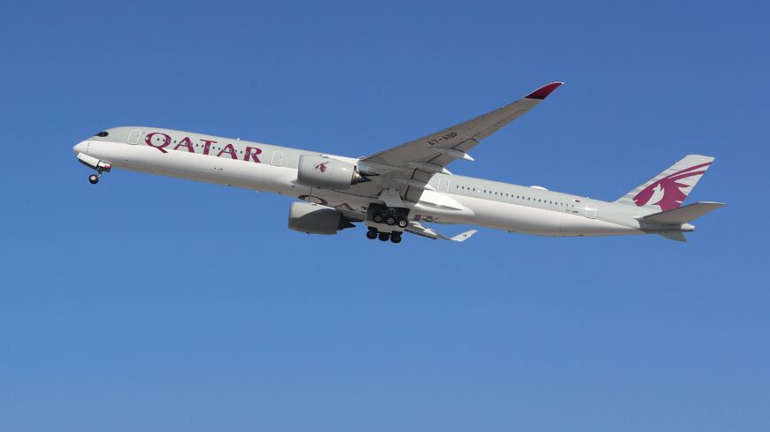 A Qatar Airways Airbus A350 airplane takes off from Hamad International Airport near the Qatari capital, Doha, on Jan. 11, 2021.