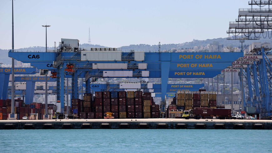 This picture shows containers and cranes on a dock of Haifa port, Israel, June 24, 2021.