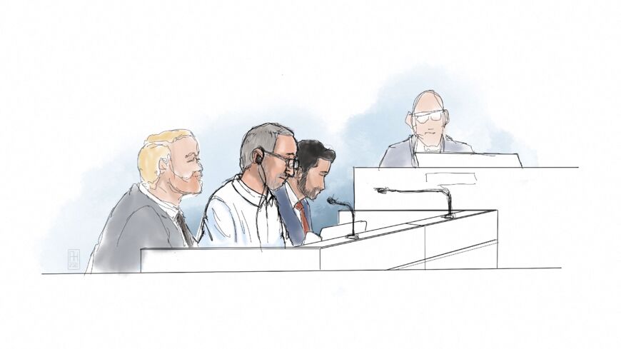 This courtroom sketch shows Iranian defendant Hamid Noury (2ndL) sitting in the District Court of Stockholm with his defense attorney Daniel Marcus (3rdL) on the opening of his trial for "war crimes and murder" on Aug. 10, 2021.