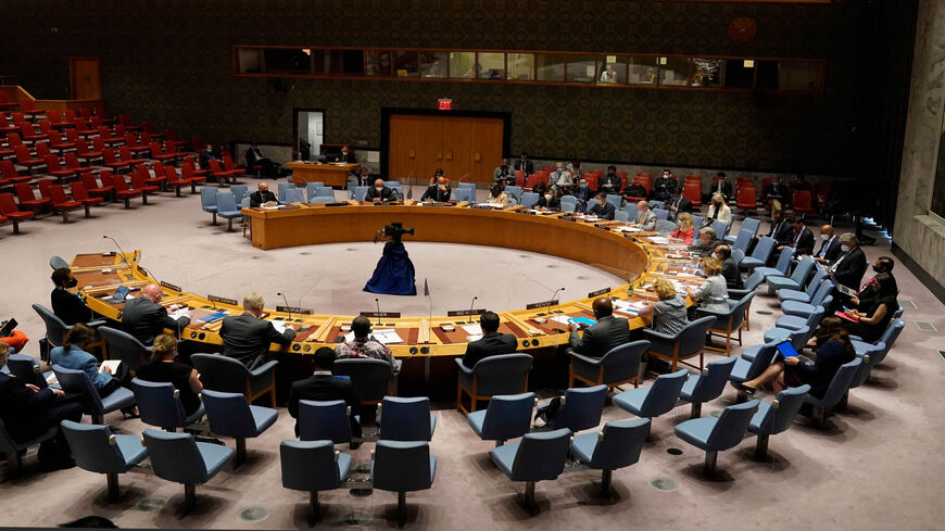 United Nations Secretary-General Antonio Guterres and others gather for a UN Security Council meeting on Afghanistan, at the United Nations, New York, Aug. 16, 2021. 