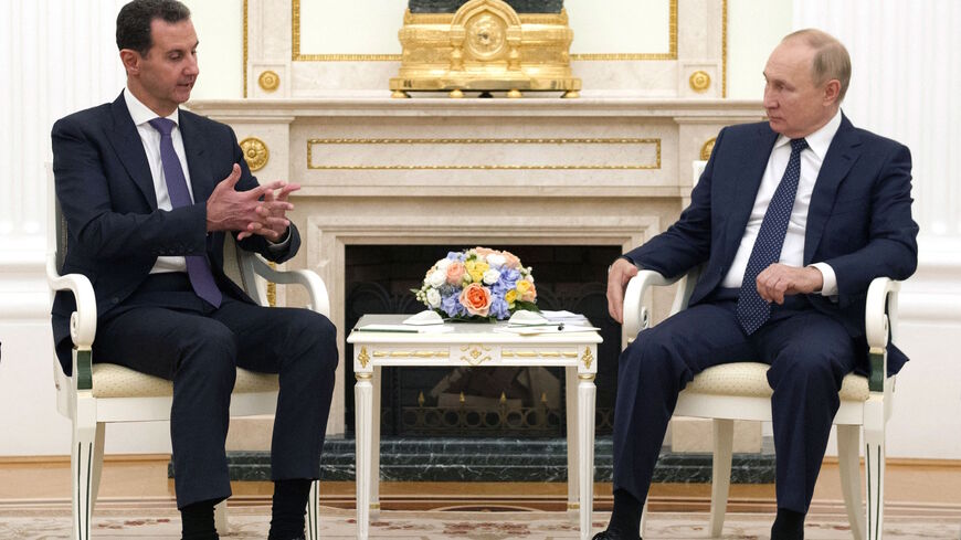 Russian President Vladimir Putin meets with Syrian President Bashar al-Assad at the Kremlin in Moscow on Sept. 13, 2021. 