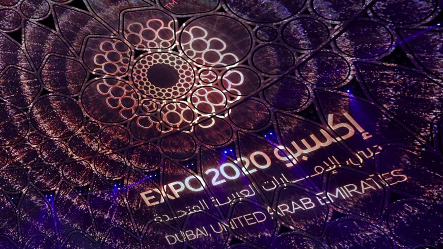 A logo of the Dubai Expo 2020 is projected during the opening ceremony, on Sept. 30, 2021. 