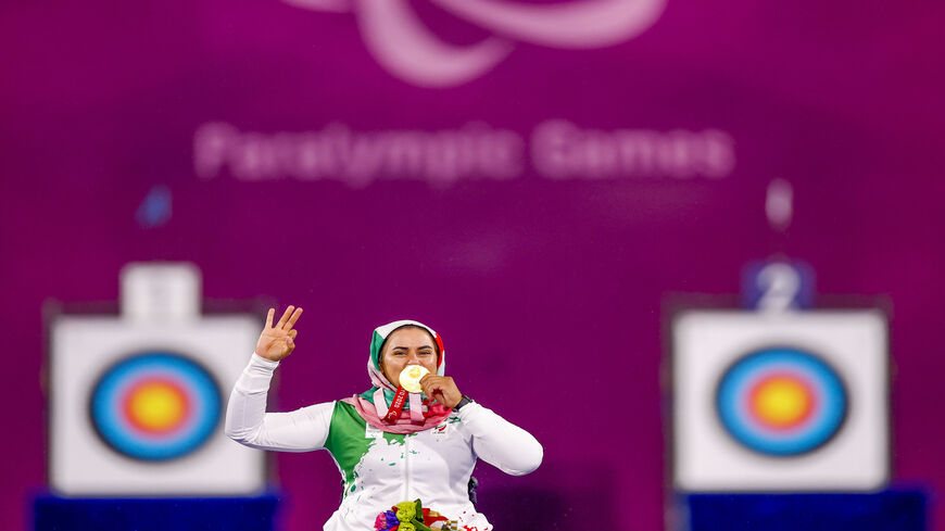 Zahra Nemati of Team Iran celebrates her gold medal in the Women's Individual Recurve gold final on day 9 of the Tokyo 2020 Paralympic Games at Yumenoshima Park Archery Field, Tokyo, Japan, Sept. 2, 2021.