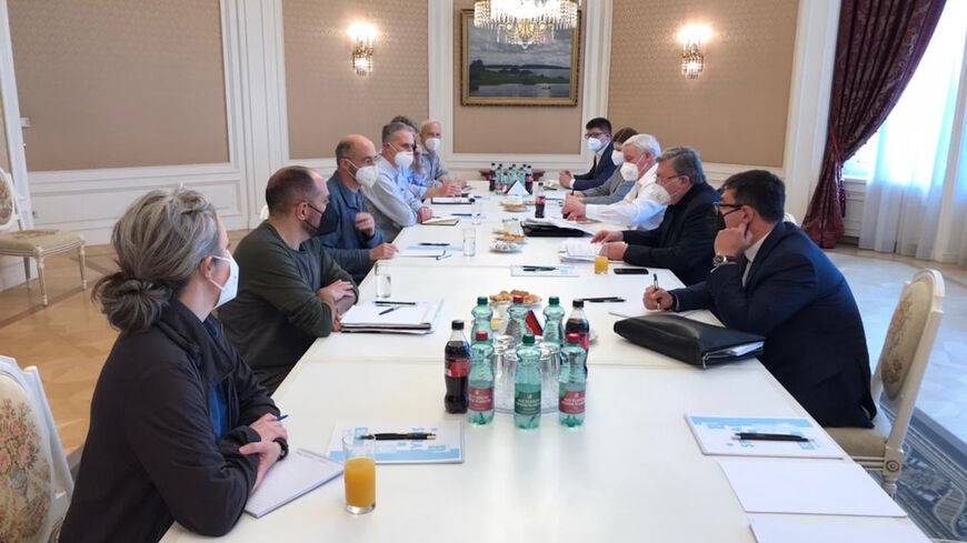 Mikhail Ulyanov, Moscow’s permanent representative to International Organizations in Vienna, mets with US Iran Envoy Robert Malley in Vienna, Austria, May 16, 2021.