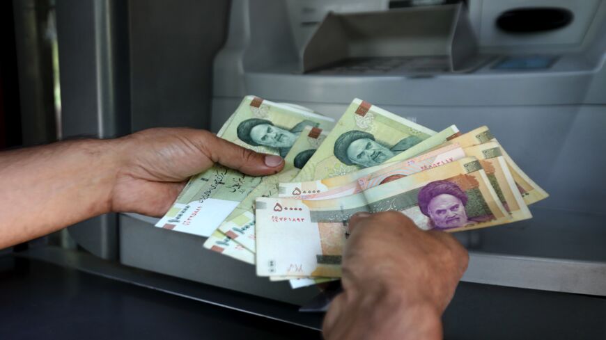Iranian rials are displayed in Tehran on July 31, 2019. 