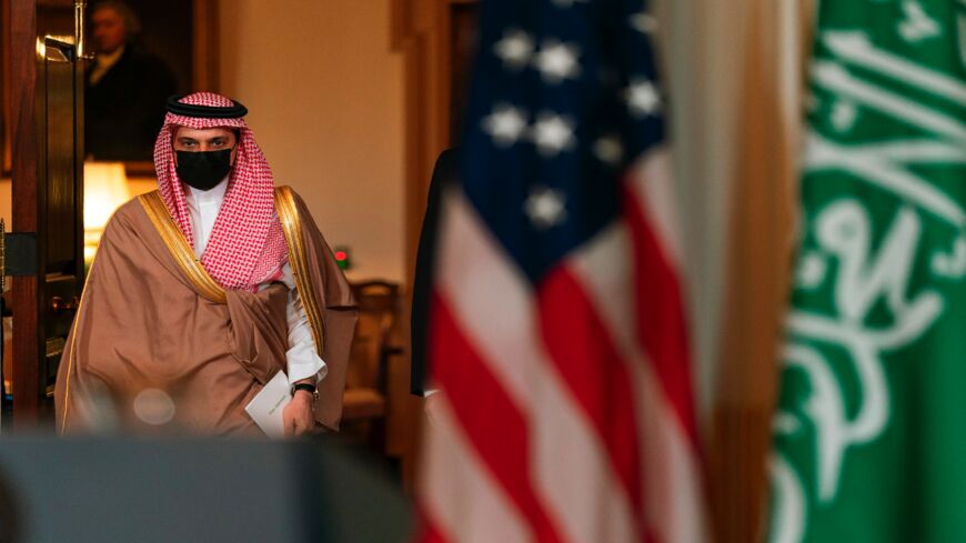 Saudi Minister of Foreign Affairs Prince Faisal bin Farhan Al Saud walks toward the Treaty Room at the State Department, October 14, 2020, in Washington, DC.