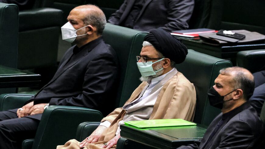 Ahmad Vahidi (interior ministry), Esmail Khatib (intelligence ministry), and Hossein Amir-Abdollahian (foreign ministry) attend a parliament session in the capital Tehran on Aug. 21, 2021.