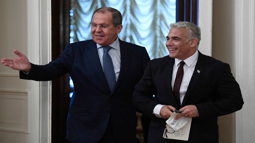 Russian Foreign Minister Sergey Lavrov meets with his Israeli counterpart Yair Lapid in Moscow, Russia, Sept. 9, 2021. 